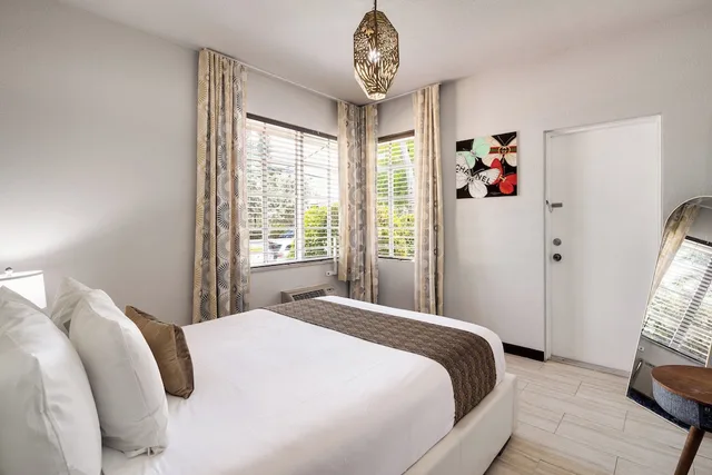 جناح بسرير كوين بغرفة نوم واحدة مع أريكة، Tradewinds Apartment Hotel 2/10