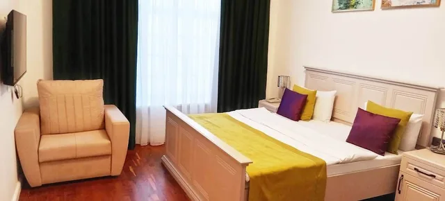 غرفة كلاسيكية ثلاثية بسرير كينج مع أريكة، Sands Of The Time Apart Hotel 1/10