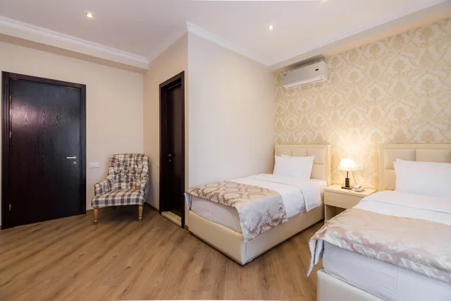 غرفة بسريرين منفصلين، Orchid Boutique Hotel 2/4
