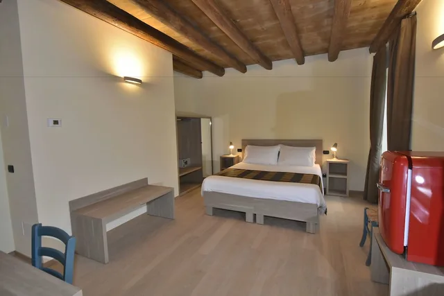 غرفة بسريرين منفصلين بإطلالة على الحديقة، Country House Le Palazzole 4/6