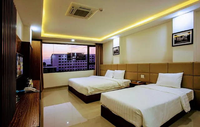 غرفة رباعية بسريرين مزدوجين بإطلالة على المدينة، Alibaba Hotel 5/8