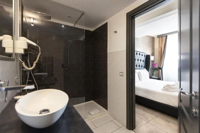 جناح جونيور بسرير كوين مع أريكة، Hotel Castellino Roma 6/8