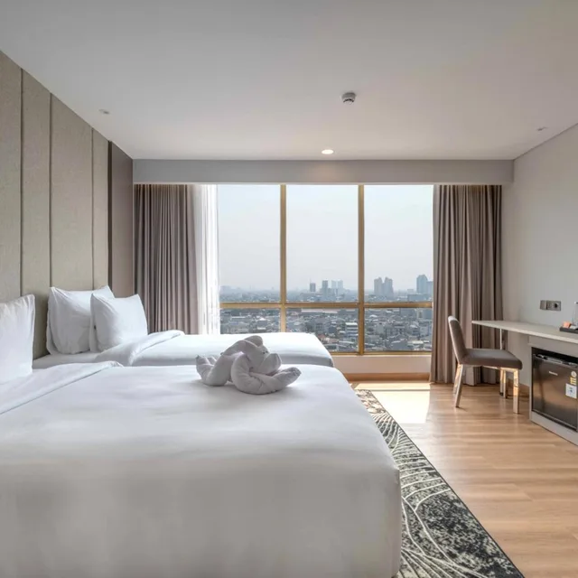 غرفة غراند ديلوكس بسريرين منفصلين، The Grand Platinum Jakarta 1/6