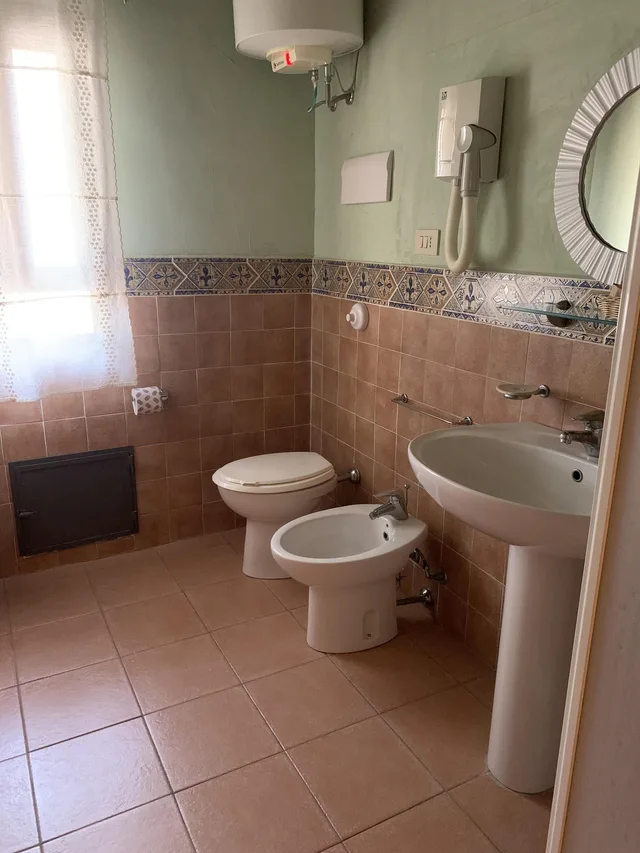 شقة عائلية بسرير مزدوج بإطلالة على الحديقة مع أريكة، Agriturismo Villa Cefala 2/3