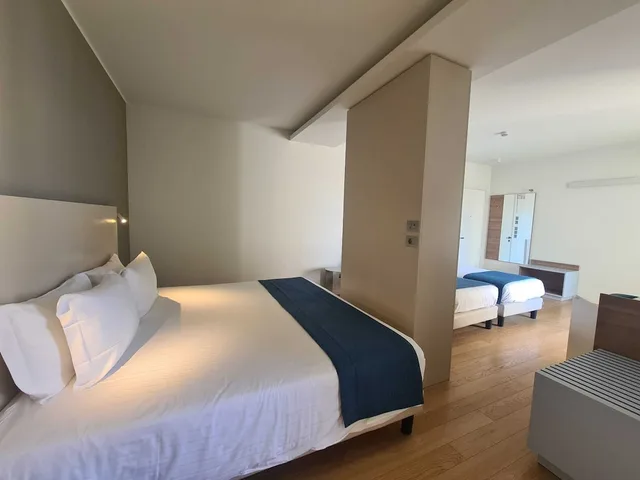 1 Bedroom, Quadruple, King and Twin Beds, Courtyard View, Hesperia Hotel & Residence 3/8