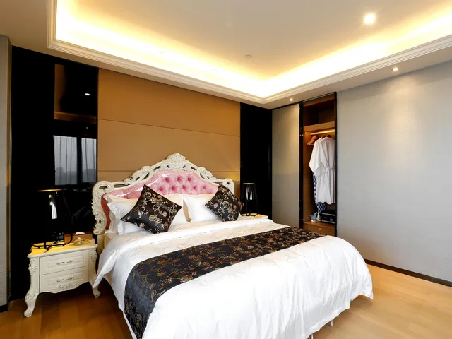 جناح ديلوكس بسرير كينج وسرير كوين، Pengman International Apartment Hotel (Beijing Road Jiedeng Duhui) 2/2