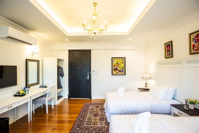 غرفة فاخرة بسريرين مزدوجين بإطلالة على المسبح، Merchant Villa 1/6