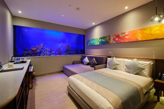 غرفة ديلوكس بسرير كوين مع أريكة، Hotel H2o 1/2
