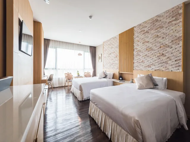 غرفة ديلوكس بسريرين منفصلين وسريرين مزدوجين، North Hill City Resort 1/2