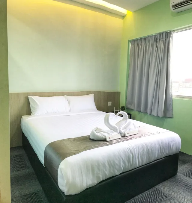 غرفة ديلوكس بسرير كوين في طابق مرتفع، Kimal Hotel Taiping 1/2
