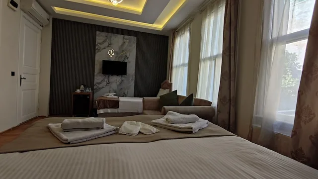 غرفة قياسية ثلاثية بسرير كوين وسرير فردي، Nuray Hotel 4/10