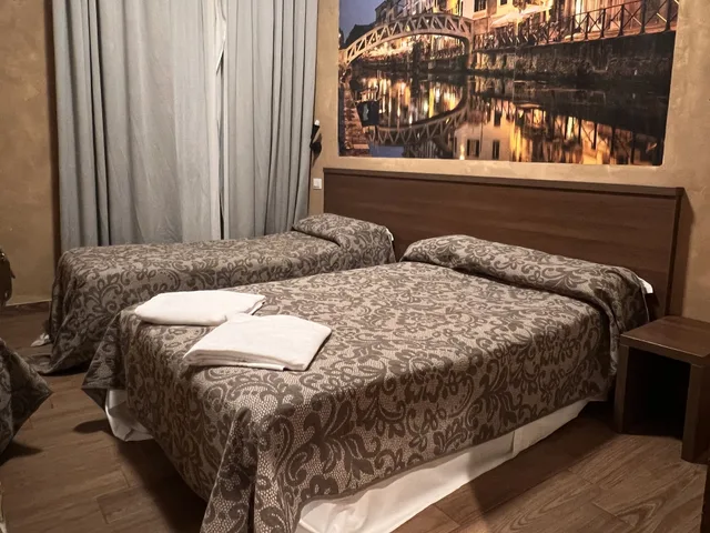 غرفة رباعية بأربعة أسرّة، Hotel Corvetto 7/10