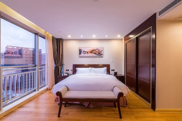 Two Bedroom Deluxe (1King+1Single), Green Court Residence Jinqiao Diamond Shanghai 1/3