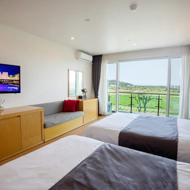 غرفة سوبيريور بسريرين منفصلين بإطلالة على الحديقة، The Four Graces Resort 3/7