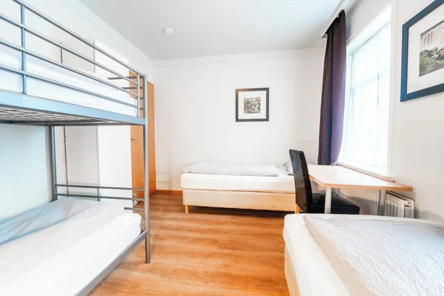 غرفة عائلية رباعية بسريرين منفصلين وسرير بطابقين بحمام مشترك، Guesthouse Andrea 1/10