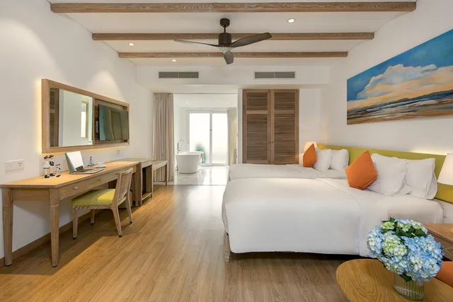 جناح جونيور بسريرين منفصلين بشرفة بحوض استحمام، Risemount Premier Resort Danang 2/6
