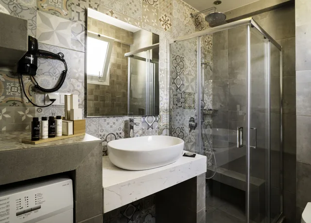 جناح ديلوكس بسرير كوين مع أريكة بمطبخ، Talos Luxury Suites 5/5