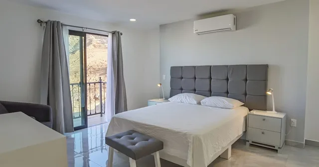 شقة ديلوكس بسرير كينج وسرير كوين بإطلالة على المدينة بشرفة مع أريكة، Collection O Morgan City Center, Los Cabos 3/5