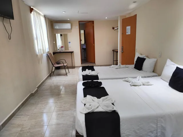 غرفة قياسية ثلاثية بسريرين مزدوجين، Hotel Ashly Loma Larga 1/5