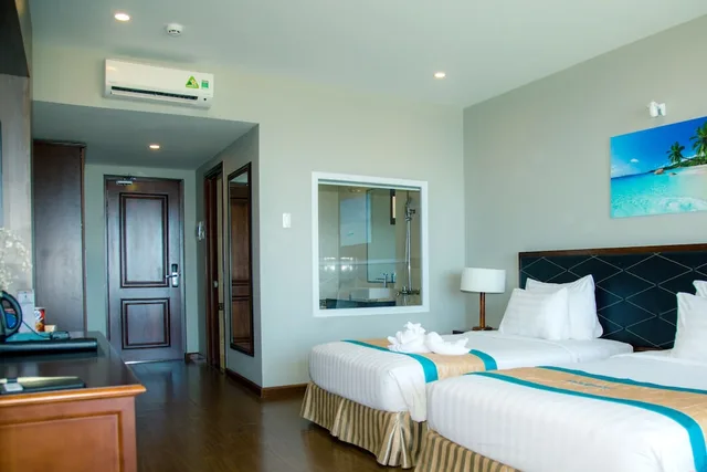 غرفة ديلوكس بسريرين منفصلين بإطلالة على الحديقة، Sandunes Beach Resort Spa 5/8