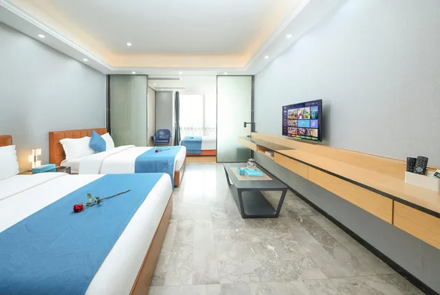 جناح ديلوكس ثلاثي بسريرين كوين، Pengman International Apartment Hotel (Beijing Road Jiedeng Duhui) 1/1
