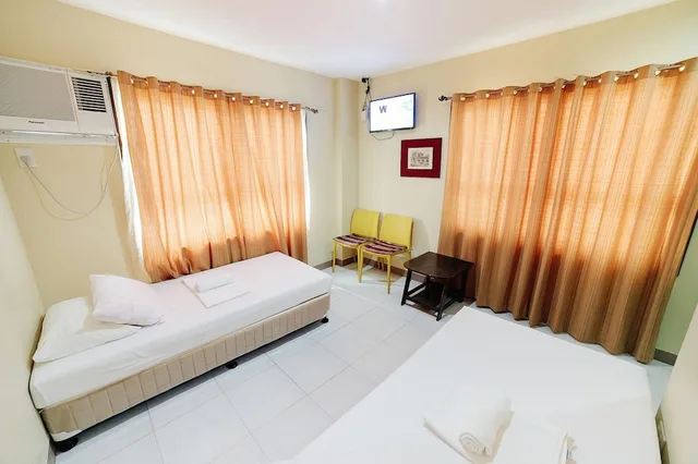 غرفة ديلوكس بسرير كوين وسرير فردي، Panglao Grande Resort 1/4