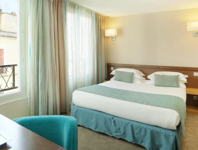 غرفة بسرير كوين، Le Grand Hotel De Normandie 1/1