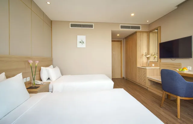 غرفة غراند بسريرين منفصلين بإطلالة على المدينة، G8 Luxury Hotel and Spa Da Nang 2/4
