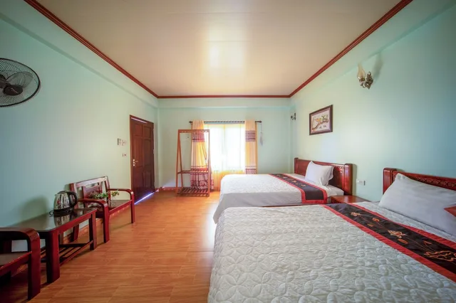 غرفة عائلية بسرير كوين وسرير فردي بشرفة، Tam Coc Tuan Minh Homestay 5/10