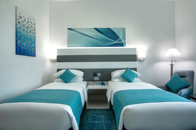 غرفة قياسية بسريرين منفصلين، City Avenue Al Reqqa Hotel 2/4