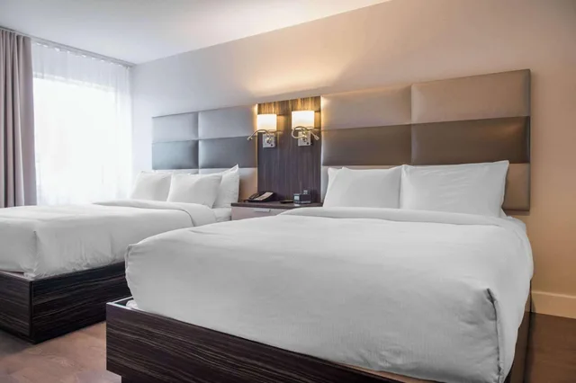 Efficiency, Suite, Multiple Beds، Les Suites Victoria Ascend Hotel Collection 2/4