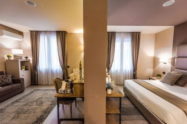 جناح حصري بسرير كينج مع أريكة، Delle Vittorie Luxury Suites & Rooms 1/5