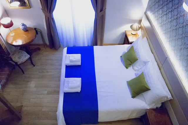 غرفة ديلوكس بسرير كوين مع أريكة، Navona Residenza De Charme 5/10