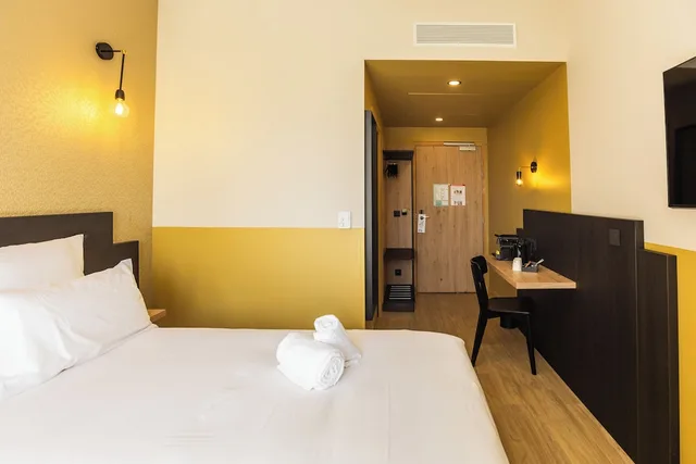 غرفة سوبيريور عائلية مفردة بسرير كوين مع أريكة، All Suites Hotel Paris Pleyel L’Ile Saint Denis 1/10