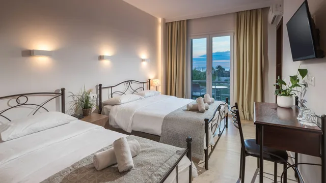 غرفة بسرير كوين بإطلالة على البحر، Minavra Hotel 5/6