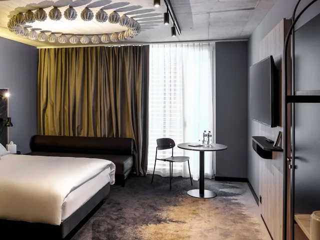 Lounge, Junior Suite, King Bed, Sofa، Mercure Hotel Delemont 4/9