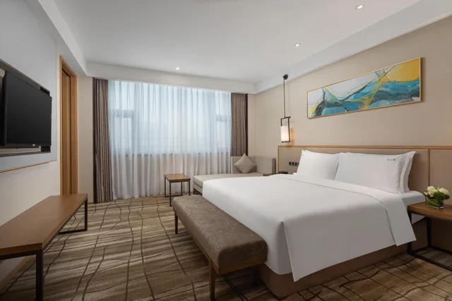 جناح بسرير كينج بغرفة نوم واحدة مع دخول الصالة، Holiday Inn Chengdu Airport 1/2