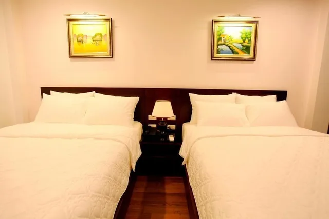 غرفة سوبيريور رباعية بسريرين مزدوجين، Camellia Hotel 2/3