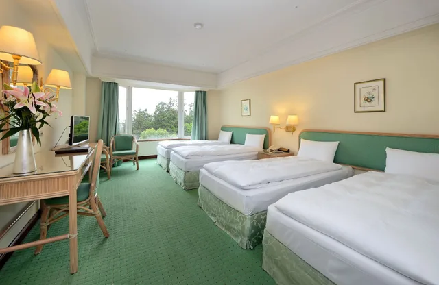 غرفة كلاسيكية رباعية بسريرين مزدوجين، Le Midi Hotel Chitou 4/7