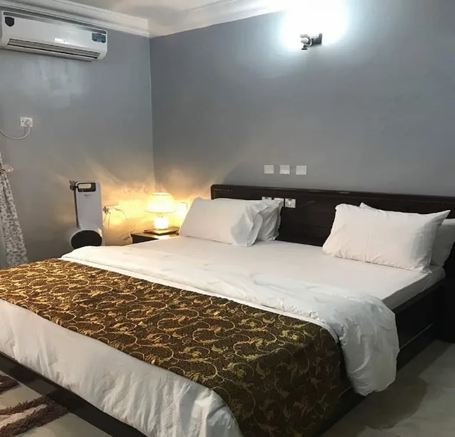 غرفة تنفيذية بسرير كوين، Jim-Eddy Suites 1/2