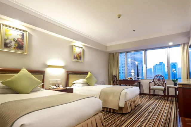 غرفة ديلوكس بسريرين منفصلين بإطلالة على المدينة، Jin Jiang Tower Hotel 2/10