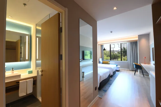 غرفة قياسية بسريرين منفصلين بإطلالة على المدينة، Holiday Inn Express Tianjin Binhai an IHG Hotel 3/4