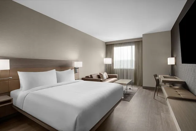 Room, King Bed, Sofa, AC Hotel by Marriott Pittsburgh Southpointe 1/3