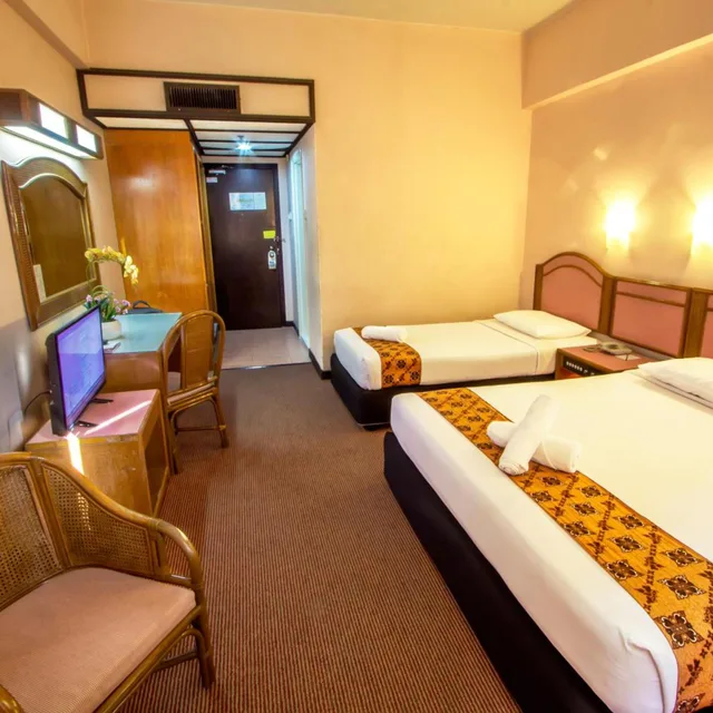 غرفة ديلوكس ثلاثية بسرير فردي، Hotel Grand Continental Langkawi 1/8