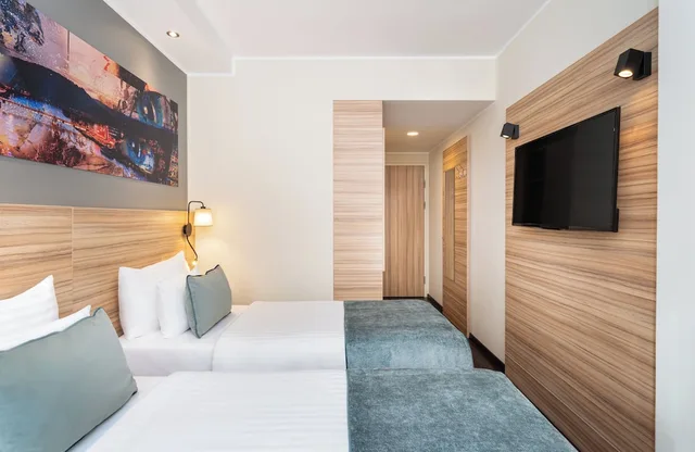 غرفة كومفورت بسريرين منفصلين، Leonardo Boutique Hotel Linz City Center 2/5