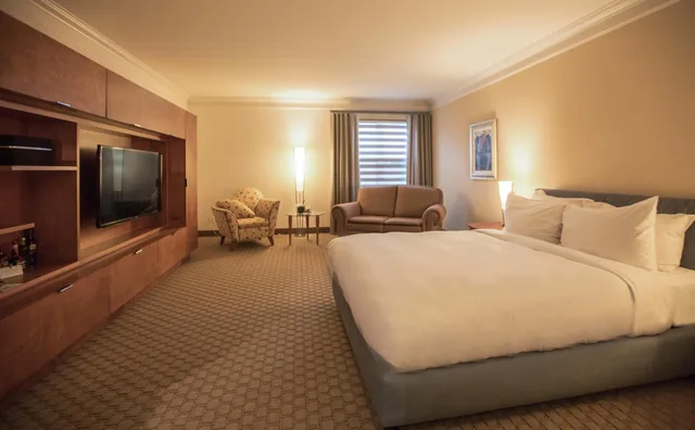 غرفة بسرير كينج وسرير كوين، Hotel Le Bonne Entente 2/3