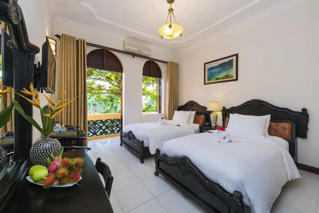 غرفة سيغنتشر بسرير كينج بإطلالة على النهر بشرفة، Nesta Hoi An Resort and Spa 4/10