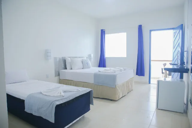 غرفة سوبيريور ثلاثية بسرير مزدوج وسرير فردي بشرفة، La Suite Praia 3/9