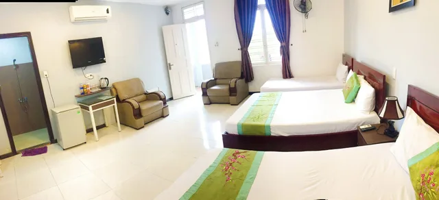 سكن مشترك مختلط عائلي بسرير كوين وسريرين كوين بإطلالة على الحديقة، QUAN QUAN HOTEL 4/5