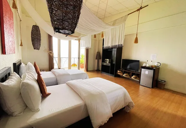 غرفة جونيور بسريرين منفصلين مع أريكة، Sunset At Aninuan Beach Resort 3/6